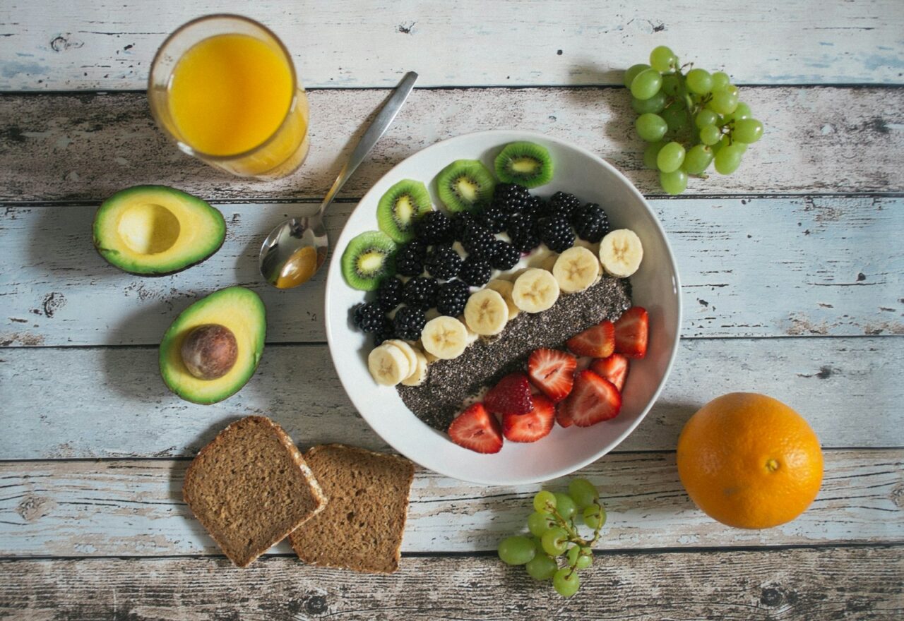 Person preparing a healthy breakfast as part of a daily wellbeing routine