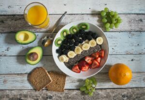 Person preparing a healthy breakfast as part of a daily wellbeing routine