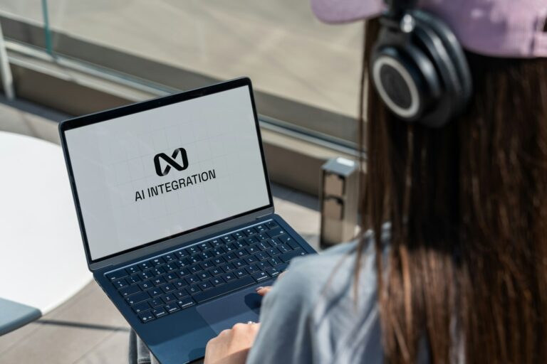 Office worker using an AI assistant on a computer in a modern workplace